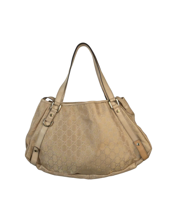 A Buyer's Guide to Vintage Gucci Bags: GG Canvas, Monogram, and What's Actually Different